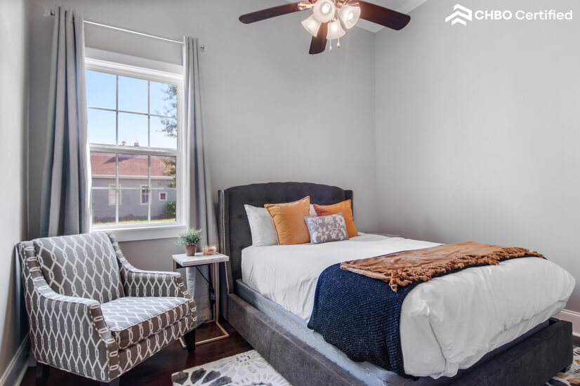 Bedroom 2 with queen bed and attached bathroo