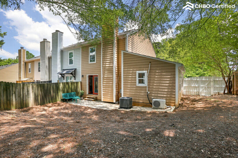 View of home from fenced yard