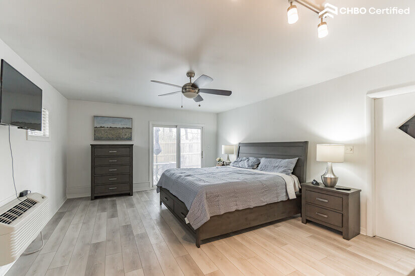 King bed in Master w/  sliding door to patio next to trail.