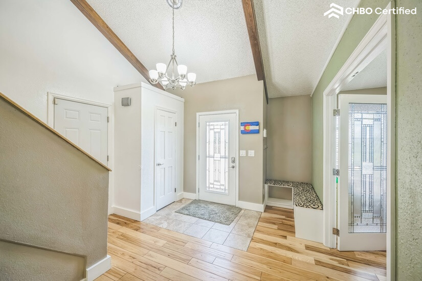 Front entrance, coat closet and shoe area