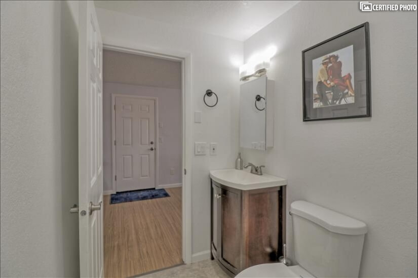 powder room with garage access view