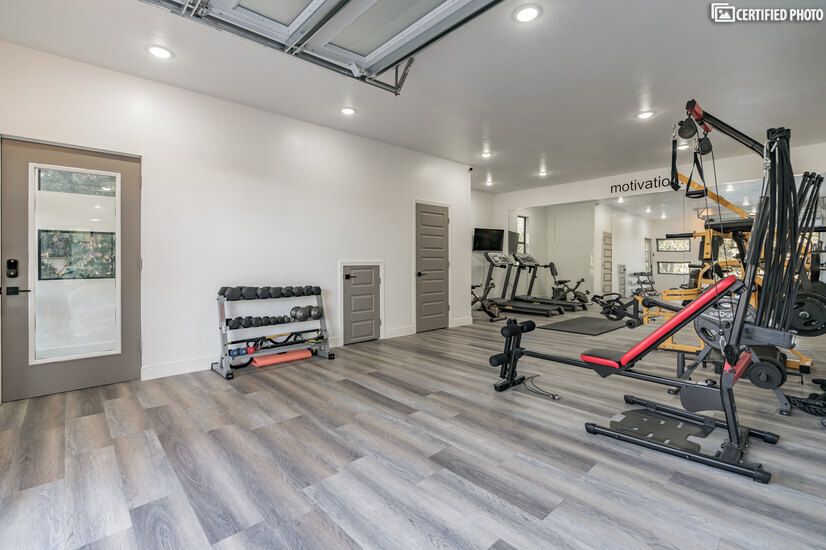fully equipped private fitness room w/ 42'' flat screen tv