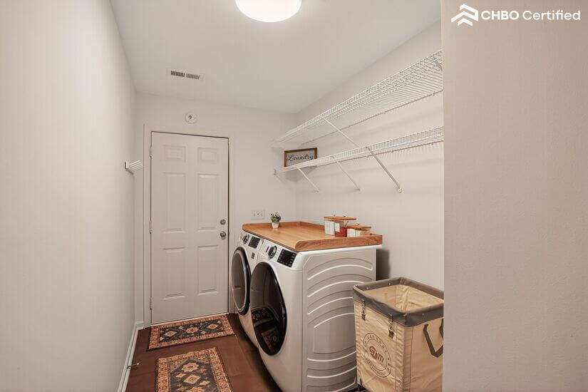 Laundry Room with GE Washer and Dryer