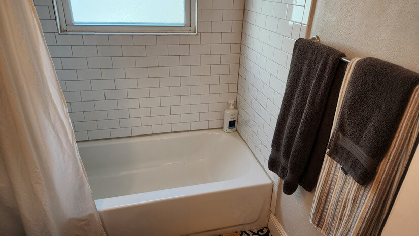 bathroom tub and shower