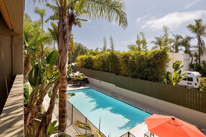 Gaze out of the balcony overlooking the pool