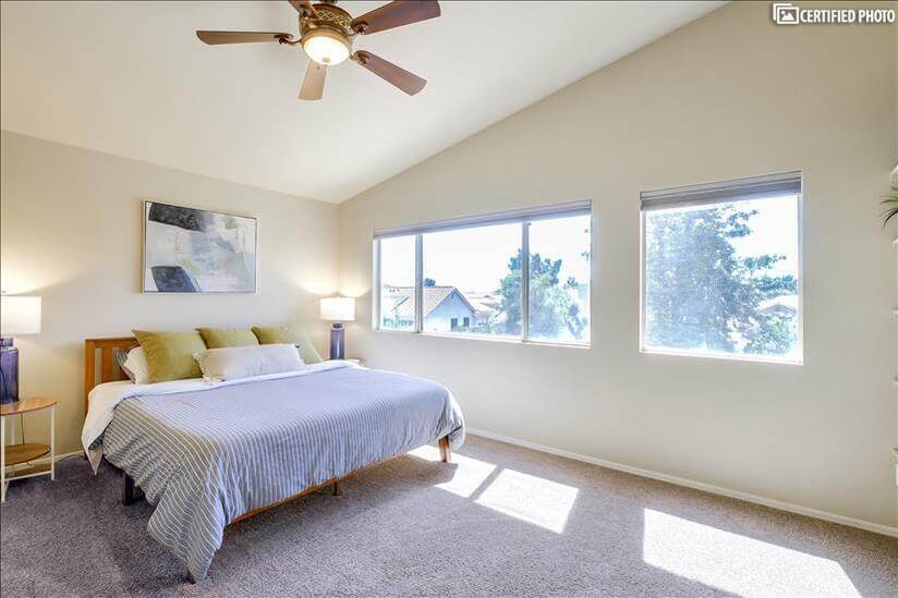 Overhead ceiling fan and blackout shades