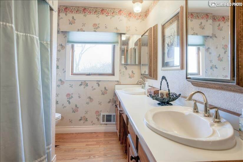 Full bath with his and her sinks.