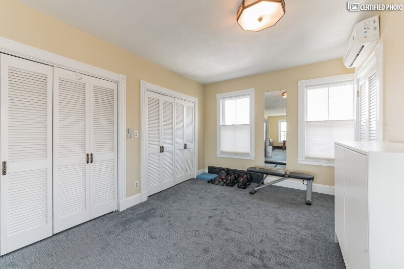 Main Bedroom with Walk-in Closets and Workout Area