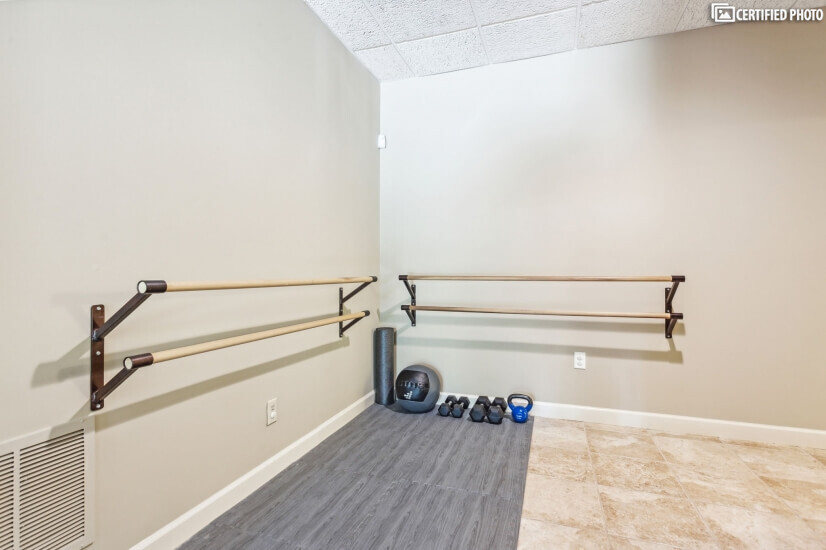 Dance bars and workout area in basement.