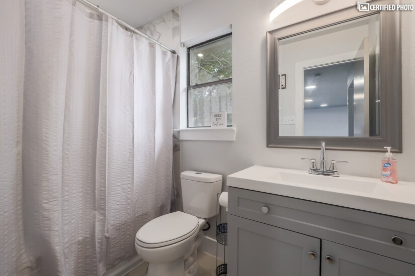Second Floor Bathroom: Full bathroom tub/shower combo.