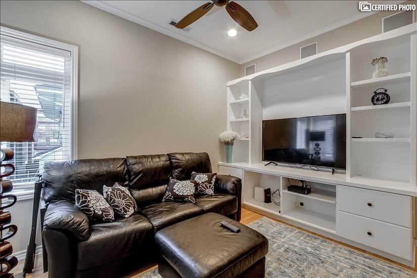 Entertainment room with Queen Pull out Leather Couch