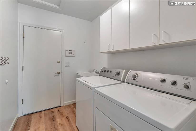Full Size Washer and Dryer in Separate Laundry Room