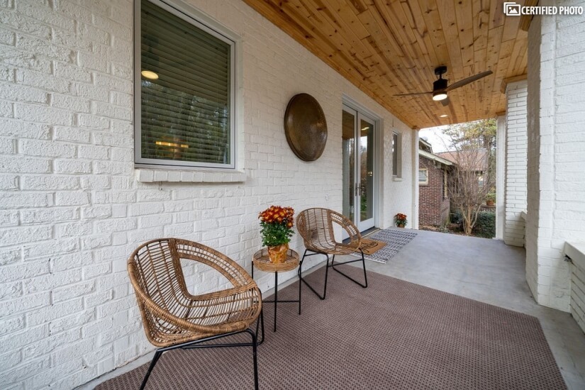 Front porch seating on first floor.