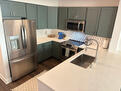 Modern Kitchen with ceramic backsplash