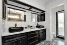 Double sinks in the primary ensuite bathroom