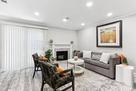 Living room with view of sliding glass door t