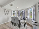 Bright Dining Room with Backyard Views
