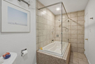 Generously sized bathtub with a deep and elon