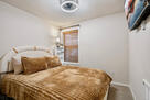 3rd bed room with queen bed