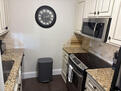 Full kitchen with full sized stove