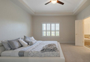 Master suite with private bathroom.