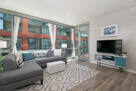 Family room with floor to ceiling windows