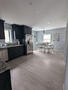 open kitchen concept with breakfast nook