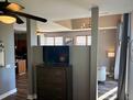 tall boy dresser in bedroom with 43 TV
