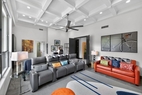 Guest wing media room with home office & ensu