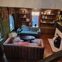 Living room, view from the to of the stairs.
