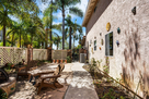 Side yard with Gate into the Front Yard and D