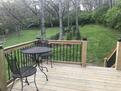 Secluded back deck off bedroom sitting area.