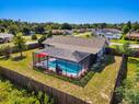 Aerial View of Home, Pool and Fenced Yard