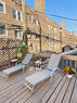 Unit 1 garage-roof deck with two loungers