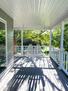 Porch swing on wrap around porch of fully fur