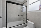The main level on-suite bathroom has a shower
