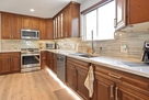 Kitchen with under cabinet lighting and floor
