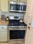 Kitchen gas stove, oven, microwave