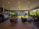 Outdoor Patio with fire pit, TV, and BBQ
