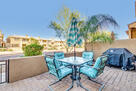 Patio with queen palm tree and mtn views