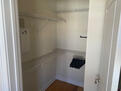 Spacious walk in closet in master bedroom
