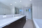 Full bath with dual sinks
