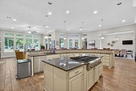 Chef&rsquo;s kitchen with oversized island