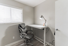 Height adjustable electric desk in office.