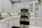 carrara quartz countertops, tiled backsplash