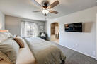 Master bedroom with large TV