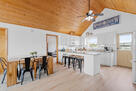 Open concept kitchen and dining space