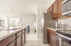 Kitchen with view of island