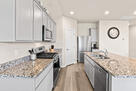 Kitchen with full size appliances