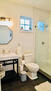 Retro style bathroom with luxurious spa showe
